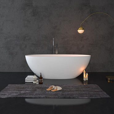 65 in. Stone Resin Flatbottom Solid Surface Freestanding Double Ended Soaking Bathtub in White with Brass Drain