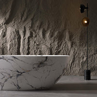 Vanityfus 30-in x 65-in Statuario White Marble Look Solid Surface Oval Freestanding Soaking Bathtub with Drain (Center Drain)