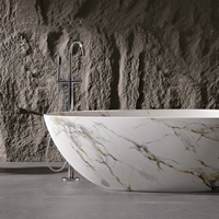 Vanityfus 34-in x 67-in Statuario White Marble Look Solid Surface Oval Freestanding Soaking Bathtub with Drain (Center Drain)
